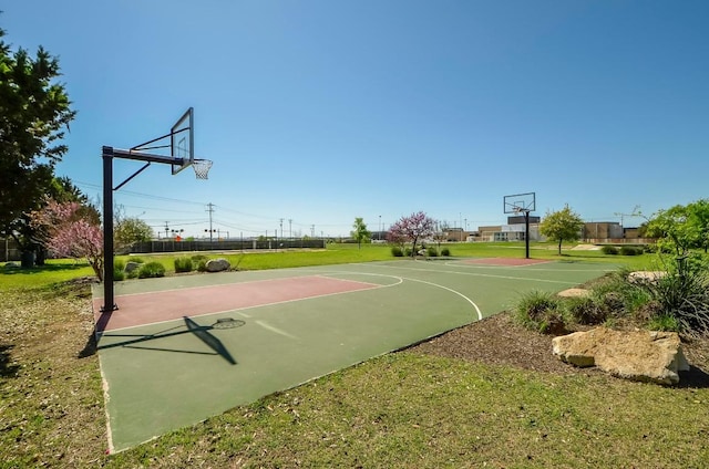 101 Verde Ranch Loop, Leander, TX 78641 - view of basketball court featuring community basketball court and a yard