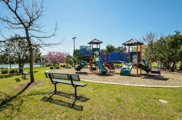 101 Verde Ranch Loop, Leander, TX 78641 - community playground featuring a lawn