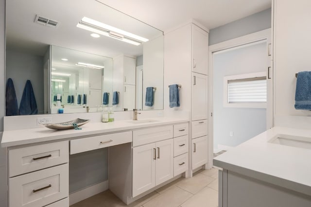 8702 Silverhill Ln, Austin, TX 78759 - full bath featuring vanity and tile patterned flooring