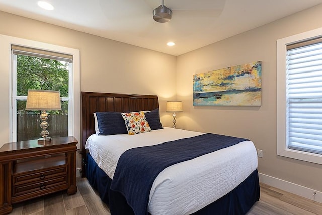 8702 Silverhill Ln, Austin, TX 78759 - bedroom with wood finished floors, recessed lighting, baseboards, and a ceiling fan