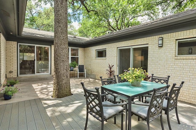 8702 Silverhill Ln, Austin, TX 78759 - deck with outdoor dining area