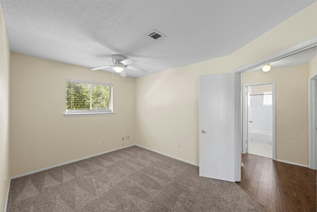 11921 Tanglebriar Trl, Austin, TX 78750 - empty room featuring ceiling fan, carpet flooring, and baseboards
