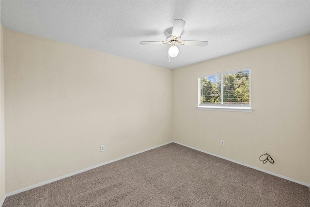 11921 Tanglebriar Trl, Austin, TX 78750 - carpeted empty room with a ceiling fan, baseboards, and a textured ceiling