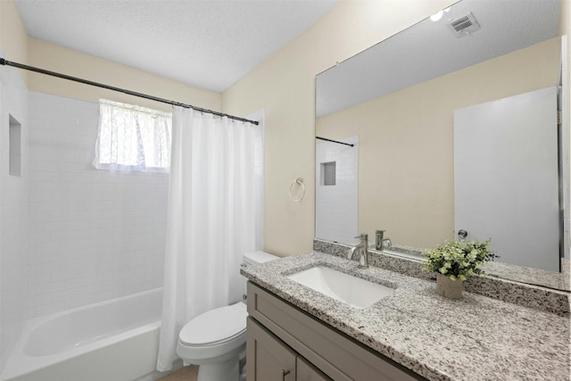 11921 Tanglebriar Trl, Austin, TX 78750 - bathroom featuring toilet, vanity, and shower / bath combo