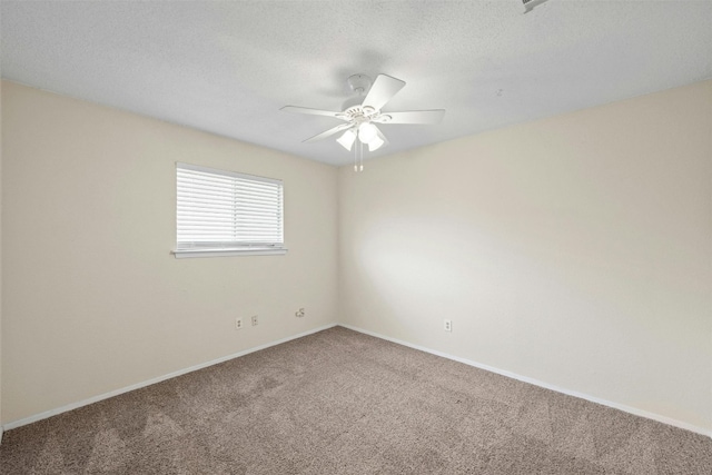 11921 Tanglebriar Trl, Austin, TX 78750 - spare room featuring carpet floors, ceiling fan, baseboards, and a textured ceiling