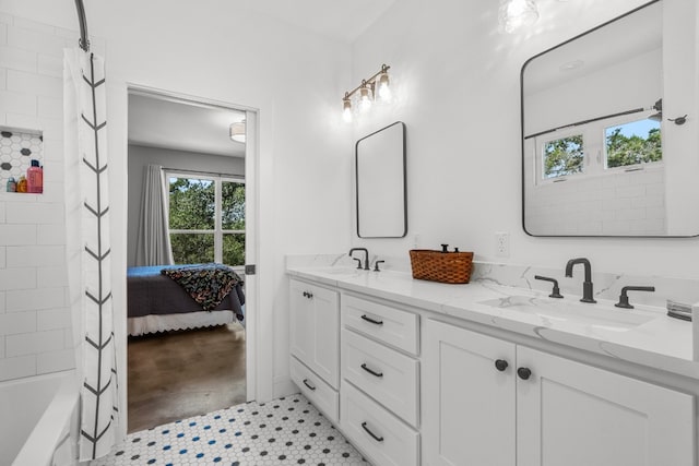 631 Lakeside Dr, Wimberley, TX 78676 - ensuite bathroom with a sink, ensuite bath, and double vanity