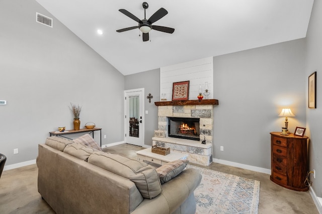 631 Lakeside Dr, Wimberley, TX 78676 - living room featuring visible vents, baseboards, a stone fireplace, and ceiling fan