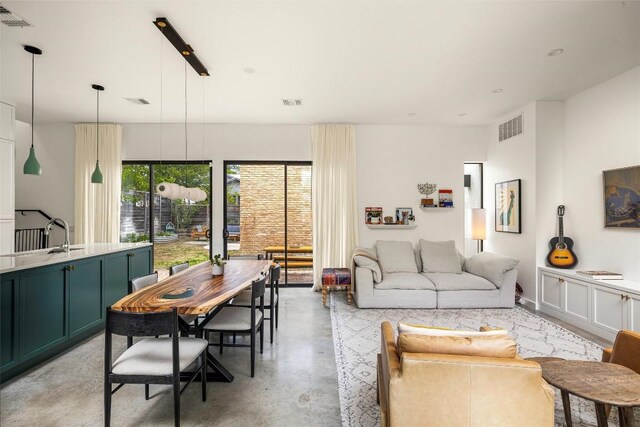 2012 Arpdale St, Austin, TX 78704 - living room featuring concrete floors