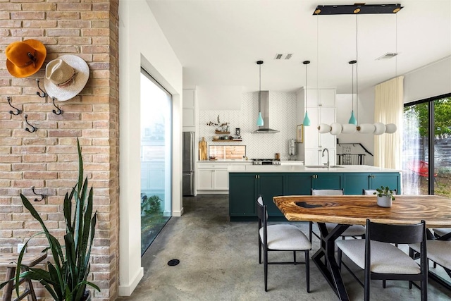 2012 Arpdale St, Austin, TX 78704 - dining space featuring finished concrete flooring