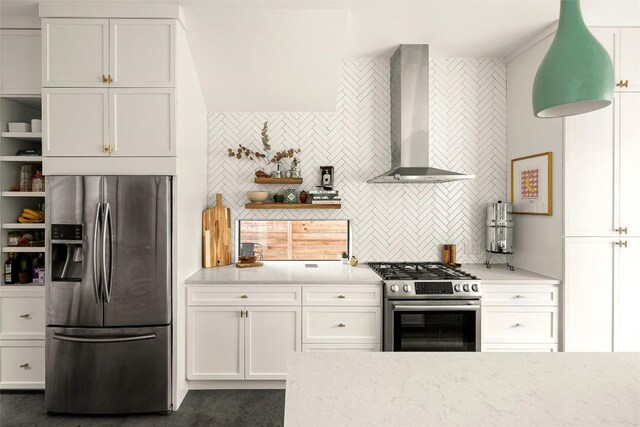2012 Arpdale St, Austin, TX 78704 - kitchen with stainless steel appliances, open shelves, wall chimney range hood, decorative backsplash, and white cabinets