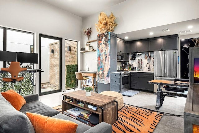 2012 Arpdale St, Austin, TX 78704 - living room with wet bar, recessed lighting, and a towering ceiling