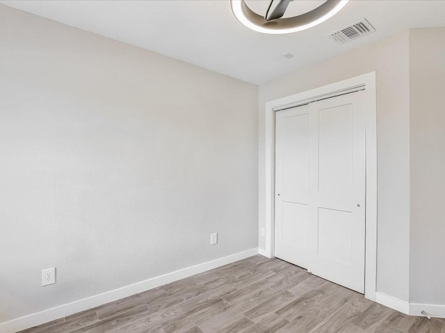 10310 Bilbrook Pl, Austin, TX 78748 - unfurnished bedroom featuring light wood-type flooring and a closet