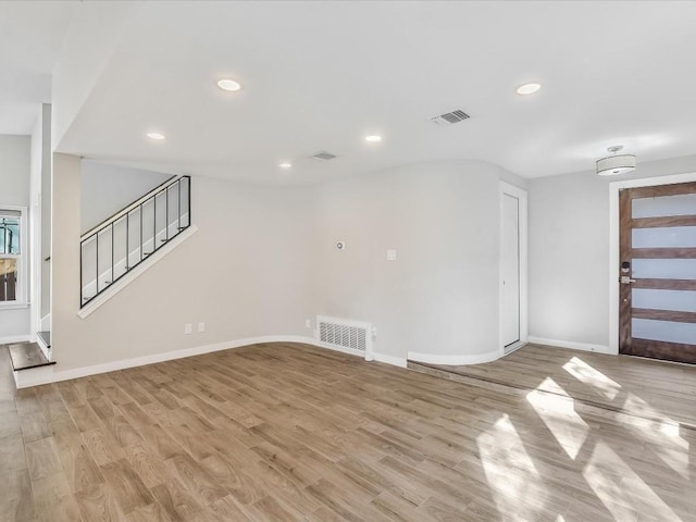 10310 Bilbrook Pl, Austin, TX 78748 - unfurnished room featuring light wood-style floors, stairway, and recessed lighting