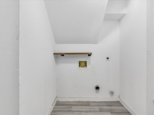10310 Bilbrook Pl, Austin, TX 78748 - washroom with electric dryer hookup, wood finished floors, and washer hookup