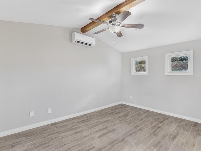 10310 Bilbrook Pl, Austin, TX 78748 - empty room with a wall mounted air conditioner, light wood-type flooring, and a ceiling fan