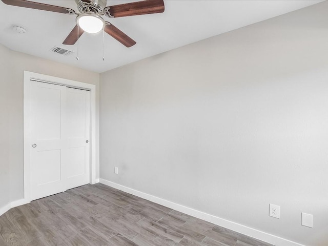 10310 Bilbrook Pl, Austin, TX 78748 - unfurnished bedroom with wood finished floors, a closet, and a ceiling fan