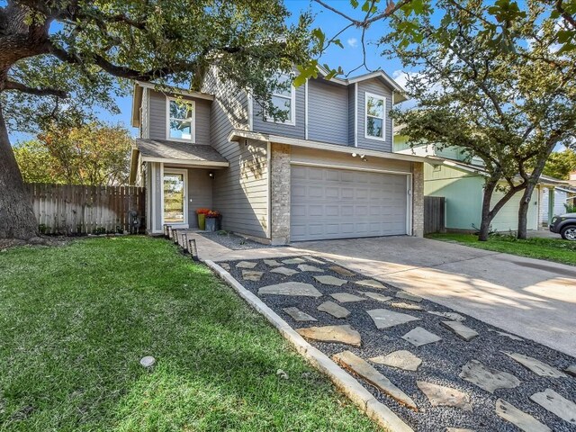 10310 Bilbrook Pl, Austin, TX 78748 - traditional-style home featuring an attached garage and concrete driveway