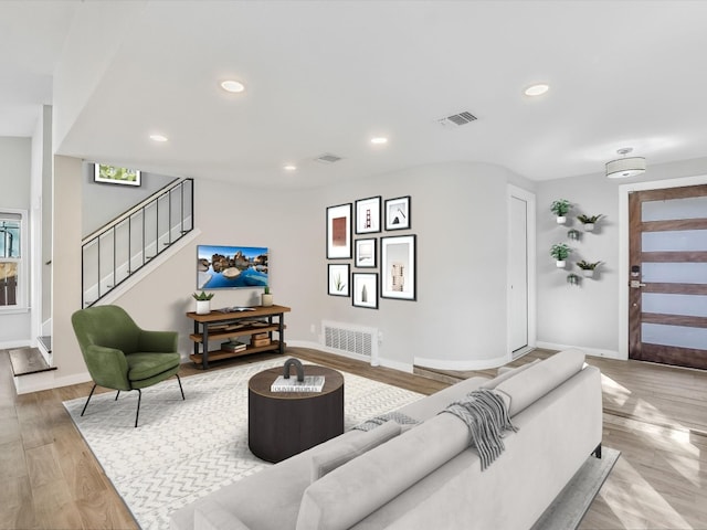 10310 Bilbrook Pl, Austin, TX 78748 - living area featuring stairs, recessed lighting, and light wood finished floors