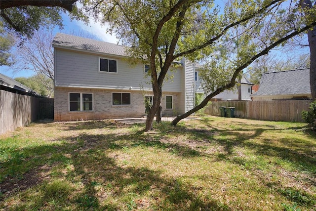 8521 Racine Trl, Austin, TX 78717 - rear view of property featuring brick siding