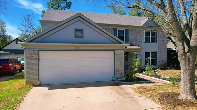8521 Racine Trl, Austin, TX 78717 - traditional-style home with brick siding, concrete driveway, and a garage