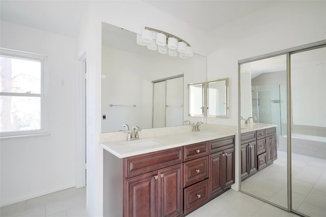 8521 Racine Trl, Austin, TX 78717 - bathroom with double vanity and tile patterned floors