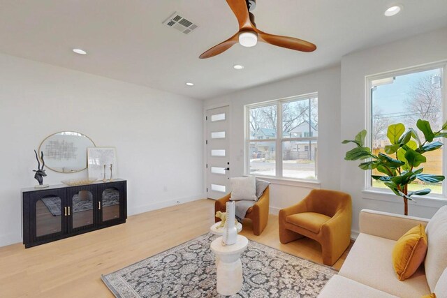4800 Prock Ln Unit A, Austin, TX 78721 - living area featuring wood finished floors, recessed lighting, ceiling fan, and baseboards