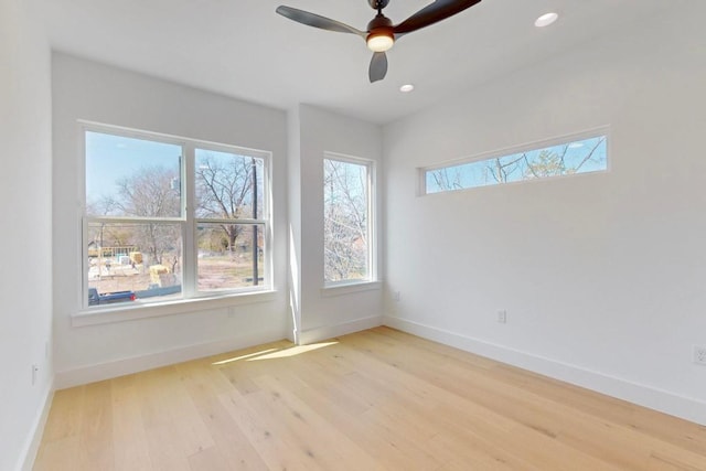 4800 Prock Ln Unit A, Austin, TX 78721 - empty room featuring light wood finished floors, ceiling fan, baseboards, and recessed lighting