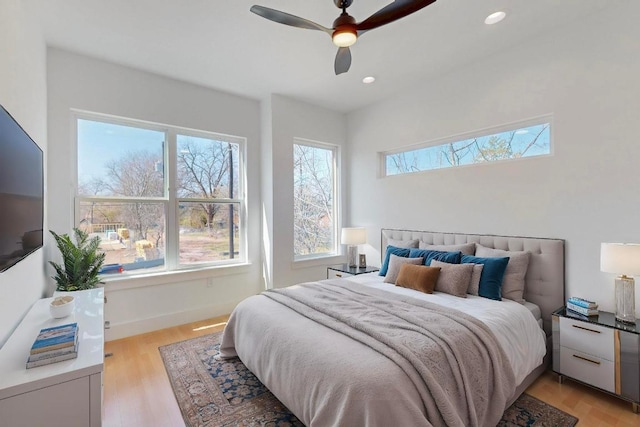 4800 Prock Ln Unit A, Austin, TX 78721 - bedroom with light wood-style flooring, recessed lighting, ceiling fan, and baseboards