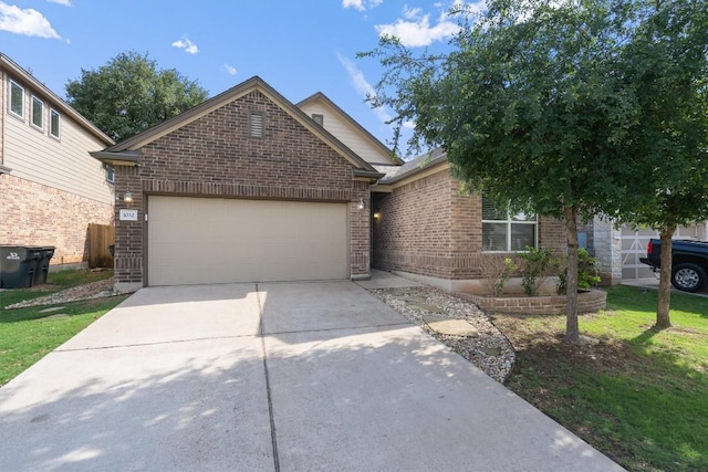 1032 Clove Hitch Dr, Georgetown, TX 78633 - ranch-style house with concrete driveway, brick siding, and a garage