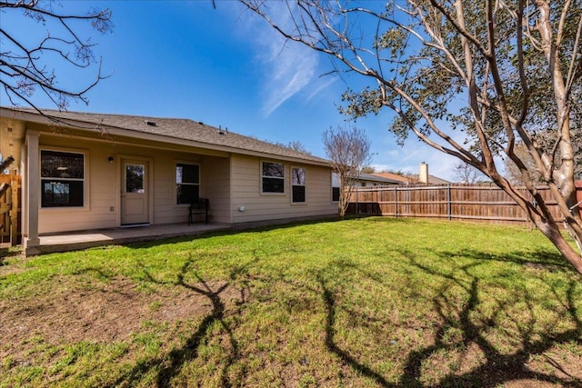 12900 Noche Clara Dr, Del Valle, TX 78617 - back of property featuring a patio