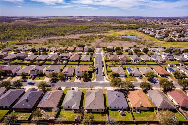 12900 Noche Clara Dr, Del Valle, TX 78617 - aerial perspective of suburban area featuring a nearby body of water