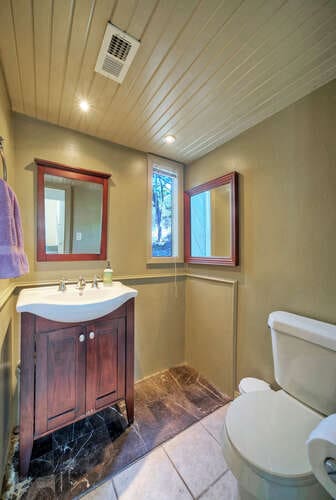 614 Sunfish St, Lakeway, TX 78734 - bathroom with toilet, tile patterned floors, wooden ceiling, and vanity