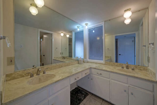 614 Sunfish St, Lakeway, TX 78734 - full bathroom with double vanity and tile patterned floors