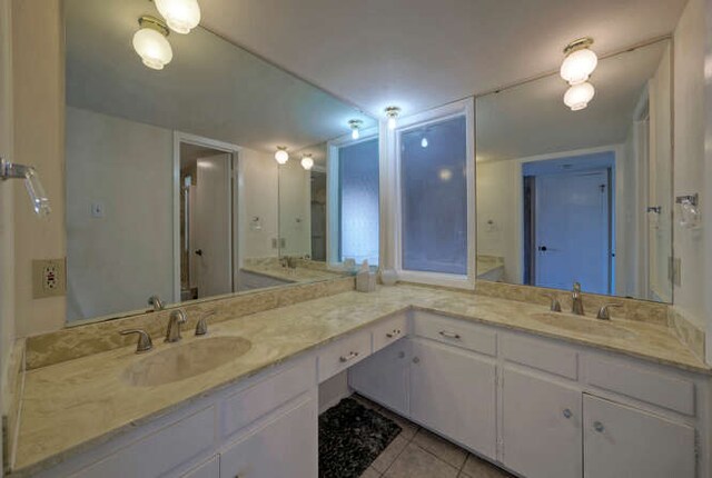 614 Sunfish St, Lakeway, TX 78734 - bathroom featuring double vanity and tile patterned floors