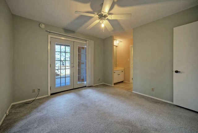 614 Sunfish St, Lakeway, TX 78734 - unfurnished bedroom featuring french doors, access to outside, baseboards, and carpet floors