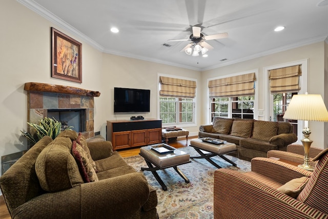 4403 Elohi Dr, Austin, TX 78746 - living area featuring light wood finished floors, a ceiling fan, crown molding, recessed lighting, and a fireplace