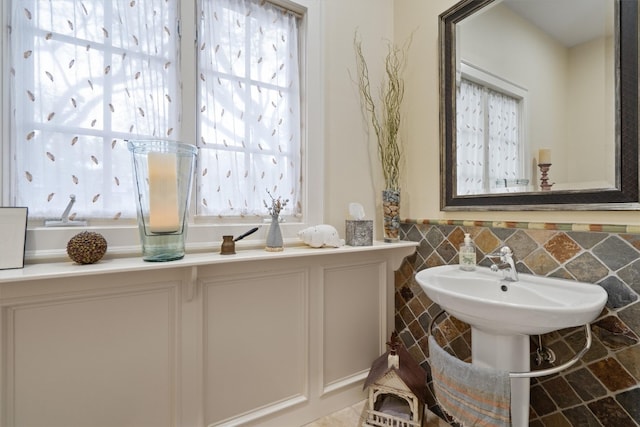 4403 Elohi Dr, Austin, TX 78746 - bathroom with wainscoting and tile walls