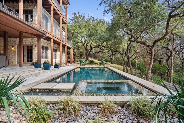 4403 Elohi Dr, Austin, TX 78746 - view of swimming pool with a patio area and a pool with connected hot tub