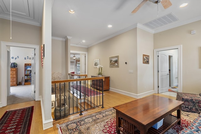 4403 Elohi Dr, Austin, TX 78746 - hallway featuring attic access, an upstairs landing, light wood-type flooring, crown molding, and recessed lighting