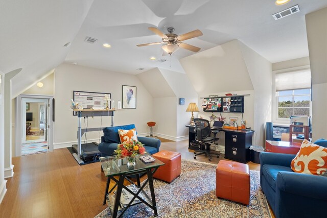 4403 Elohi Dr, Austin, TX 78746 - living area with wood finished floors, ceiling fan, lofted ceiling, a desk, and recessed lighting