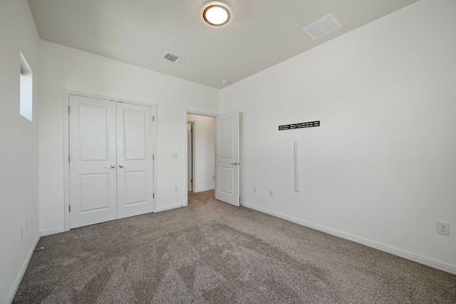 5809 Charles Merle Dr Unit B, Austin, TX 78747 - unfurnished bedroom with carpet flooring, baseboards, and a closet