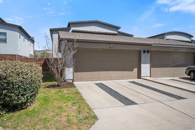 5809 Charles Merle Dr Unit B, Austin, TX 78747 - view of front facade with roof with shingles and concrete driveway