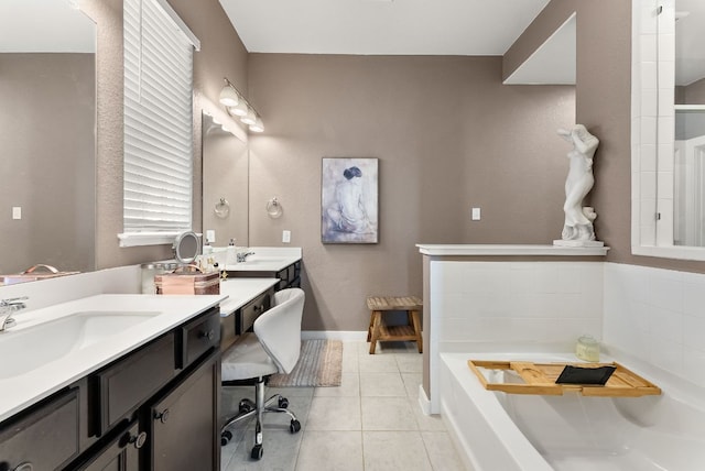 386 Nautical Loop, Kyle, TX 78640 - full bath featuring a tub, tile patterned floors, and two vanities