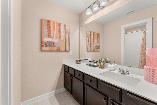 386 Nautical Loop, Kyle, TX 78640 - bathroom featuring baseboards and vanity