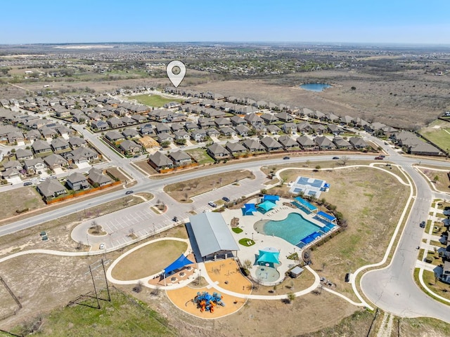 386 Nautical Loop, Kyle, TX 78640 - aerial perspective of suburban area with a pool area
