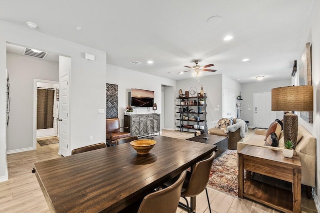 dining room with visible vents, baseboards, light wood-type flooring, recessed lighting, and a ceiling fan