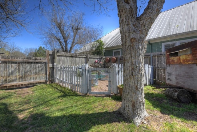 view of yard with a gate