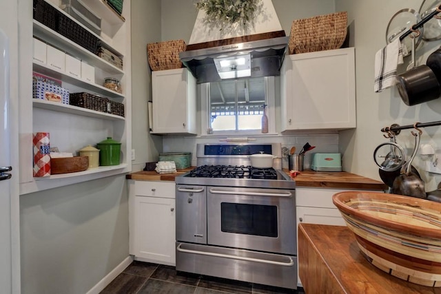 kitchen featuring wood counters, range with two ovens, white cabinetry, and open shelves