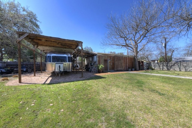 view of yard featuring a carport