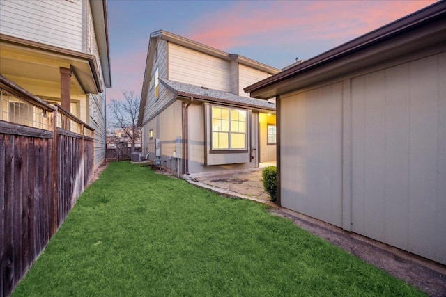 7508 Pantherpaw St, Austin, TX 78757 - property exterior at dusk with a central air condition unit